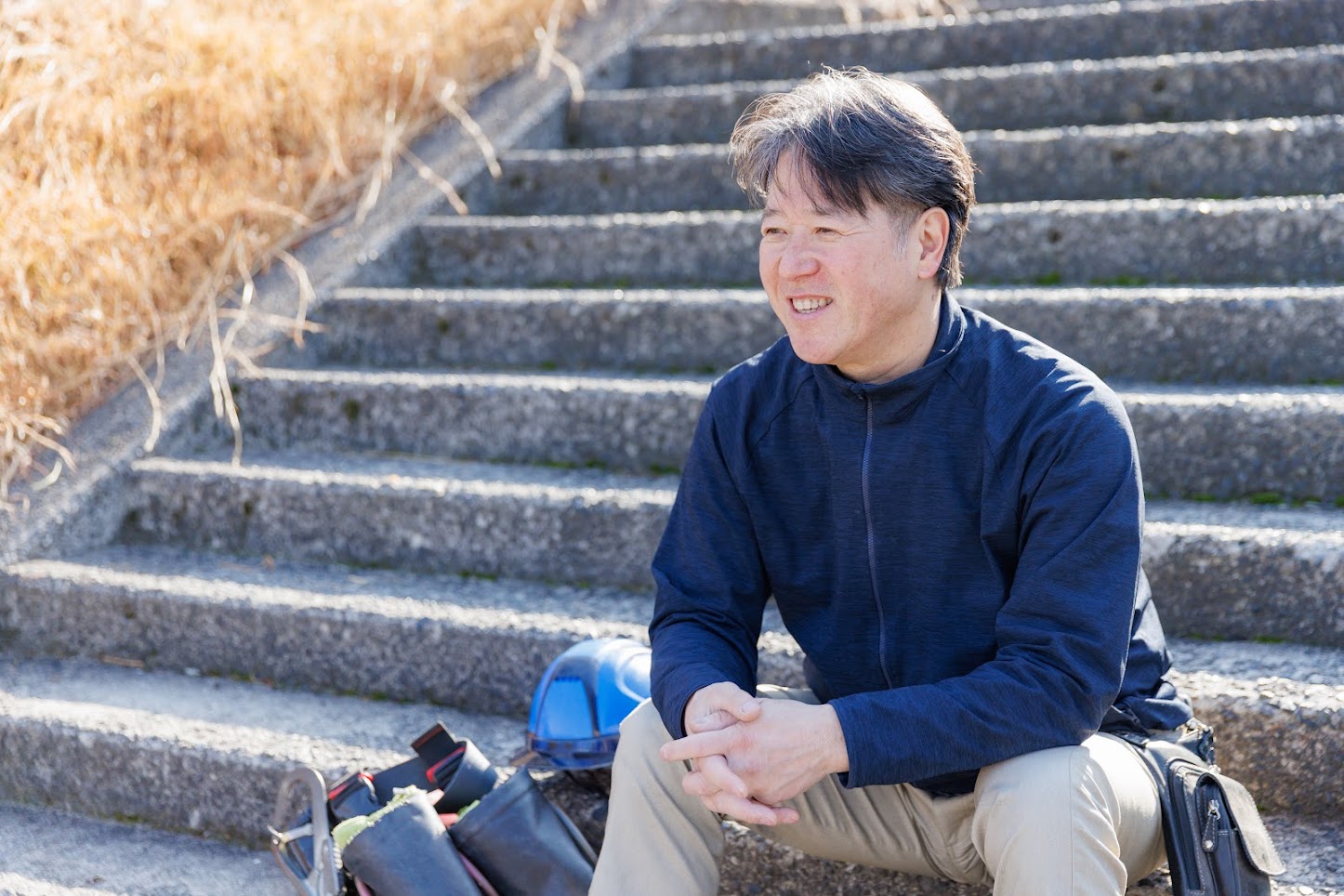 窓ガラス清掃の仕事に取り組む梅澤さん